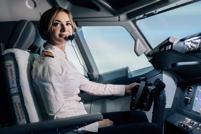woman in aircraft cockpit